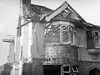 A bombed out house in 1940s wartime UK