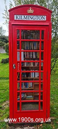 Repurposed red phone box taken over as a library