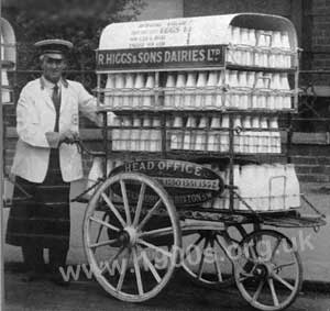 Milk in milk bottles being delivered by handcart, date uncertain