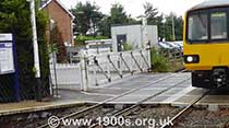 manual level crossing closed for road traffic and open for trains, thumbnail