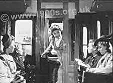 A train compartment, 1940s, showing its door to the corridor open