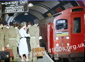 Army personnel on London Underground platforms during WW2