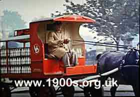 Horse-drawn 1940s United Dairies (UD) milk float 1 of 2