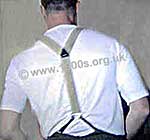 Back view of a man wearing trouser braces