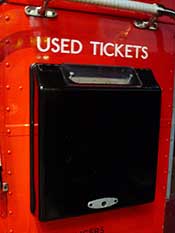 Wall container for used bus tickets