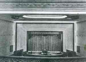 Cinema stage with curtains across the screen