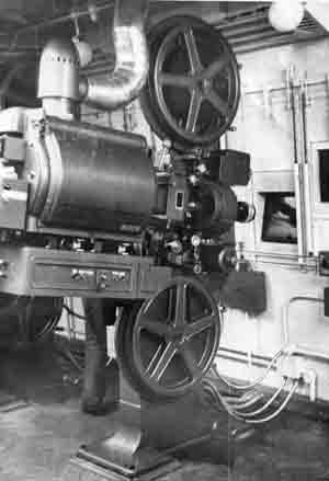 Cinema projector running 5000 ft reels
