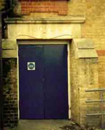 Typical early 1900s school entrance for boys leading from their own playground to the top floor