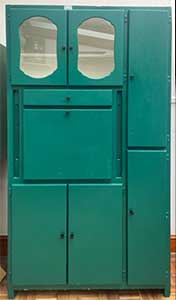 wide dark green 1950s kitchen cabinet with an additional side-cupboard