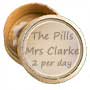 chemist pills dispensed in carboard pillbox